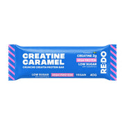 RE:DO Creatine Bar 40 g vegansk proteinbar i en blå förpackning med rosa och vita detaljer.