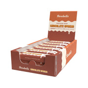 Barebells Protein Bar Spread 45 g Chocolate Spread ruskeassa ja oranssissa esittelylaatikossa, jossa on 12 proteiinipatukkaa.