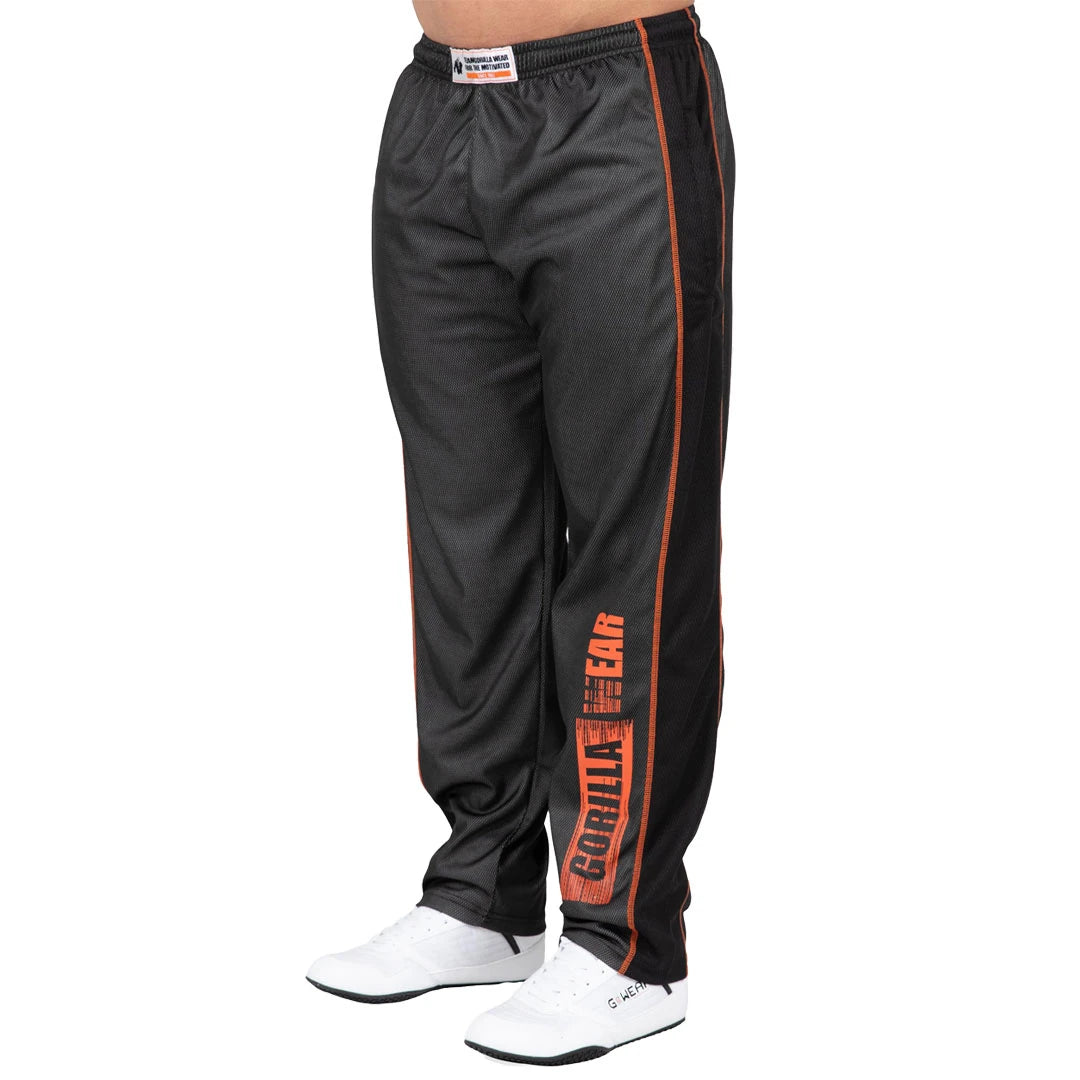 Gorilla Wear Wallace Mesh Pants Grey/Orange väljät harmaat treenihousut oransseilla saumoilla ja isolla logolla., kuva 4/4