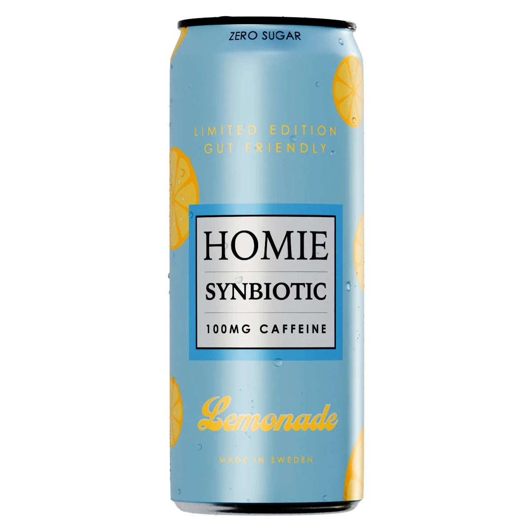 Homie Wake Up Synbiotic 330 ml vaaleansinisessä tölkissä keltaisilla sitruunaviipaleilla, makuna Lemonade.