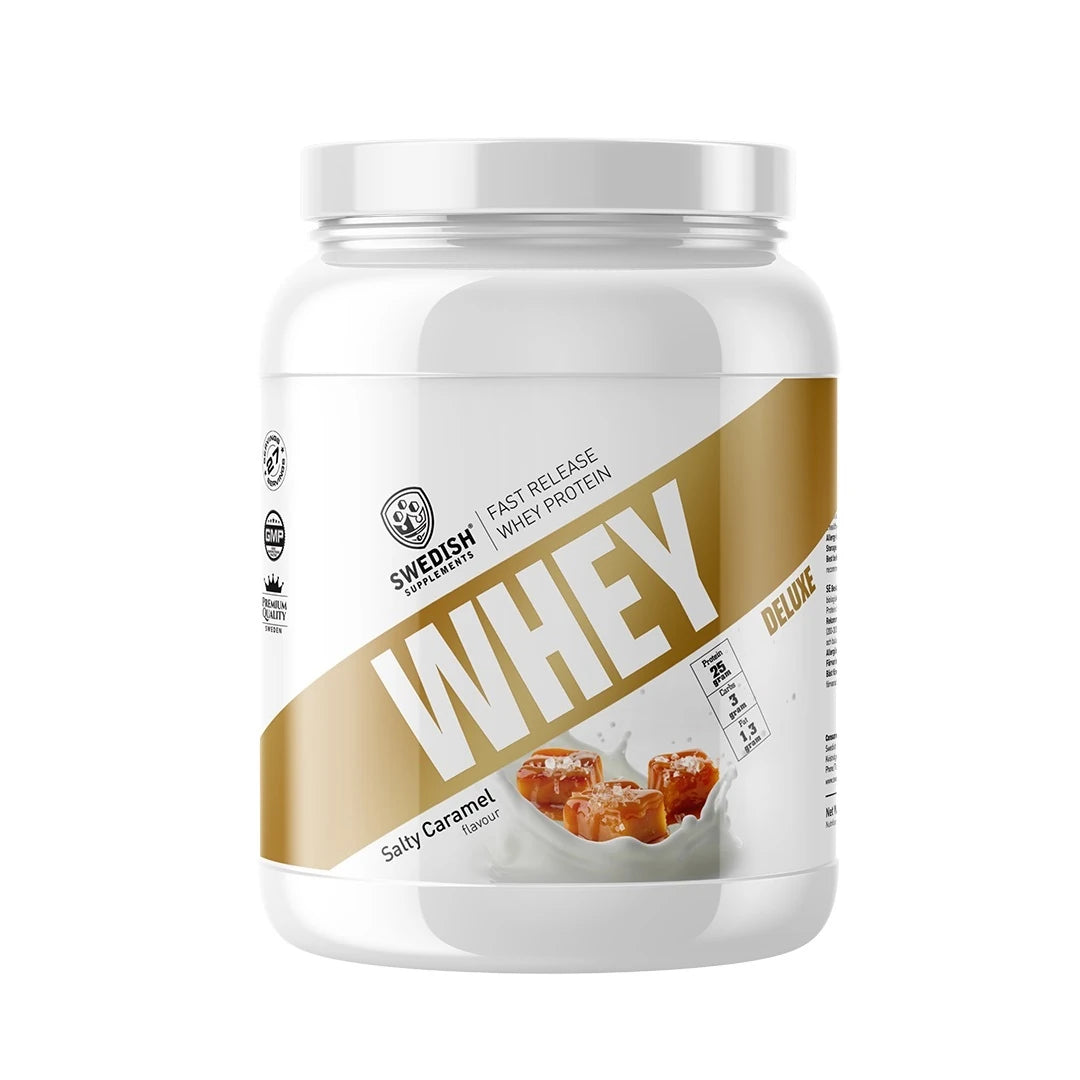 Swedish Supplements Whey Protein Deluxe 900 g -heraproteiini valkoisessa purkissa kultaisin yksityiskohdin, makuna Salty Caramel., kuva 2/4
