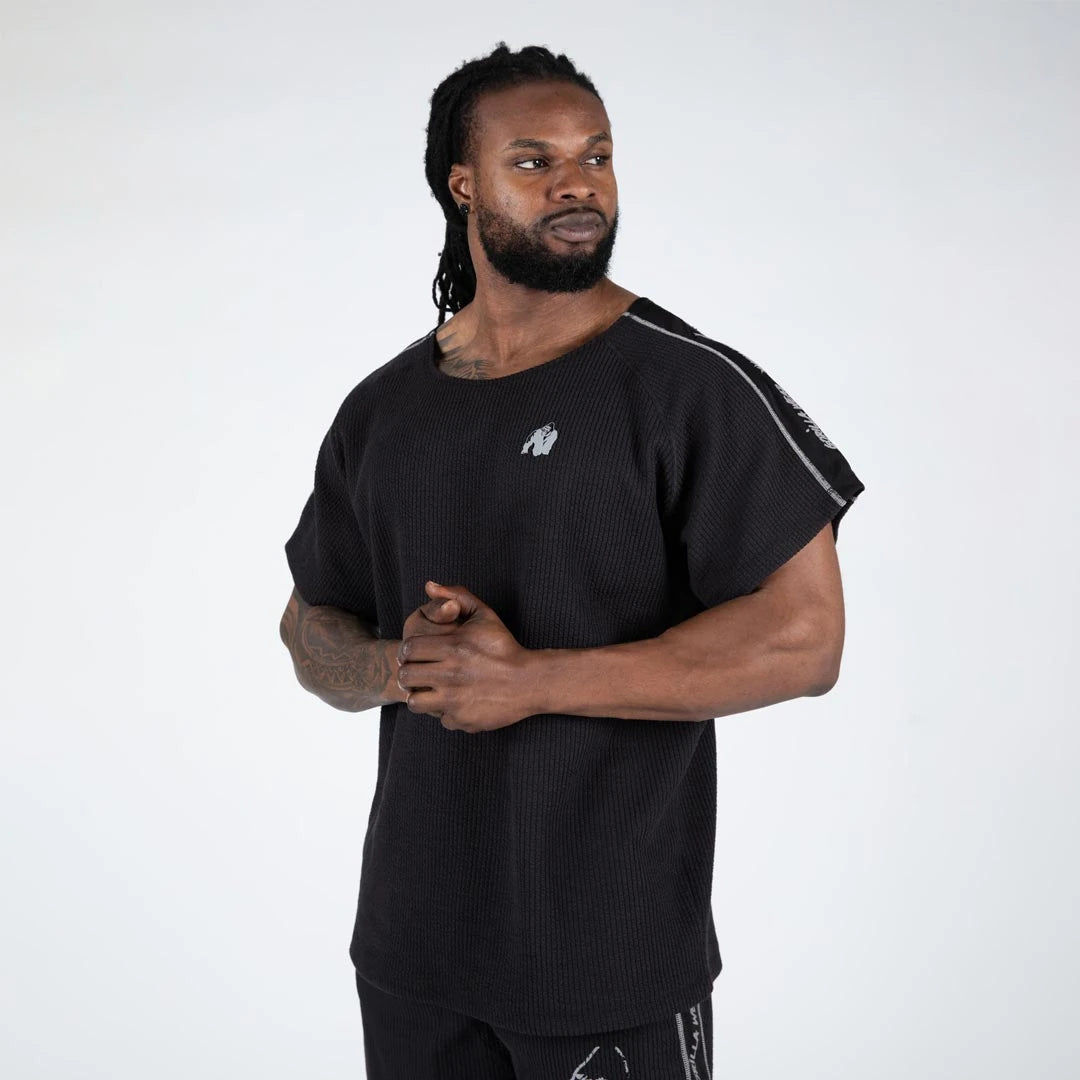 Musta joustinneuleinen Gorilla Wear Buffalo Old School Workout Top black/grey -t-paita harmailla yksityiskohdilla.