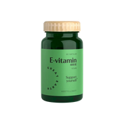 Great Earth E-Vitamin 60 caps tummanvihreässä purkissa, jossa on vaaleanvihreä etiketti ja vaalea puukansi.