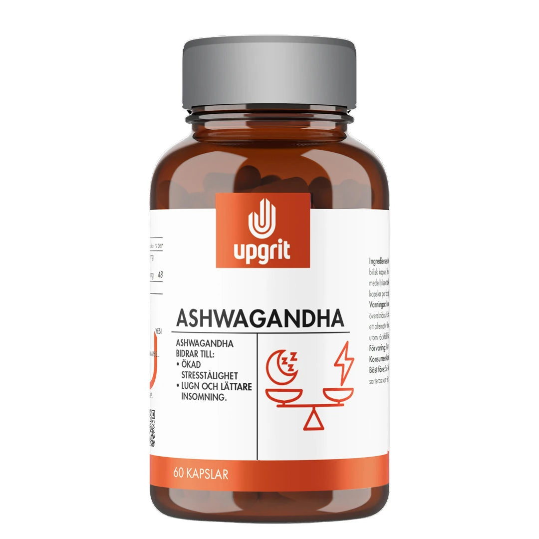 Upgrit Ashwaganda 60 caps ruskeassa purkissa valkoisella ja oranssilla etiketillä, edistämään stressinsietokykyä., kuva 1/1