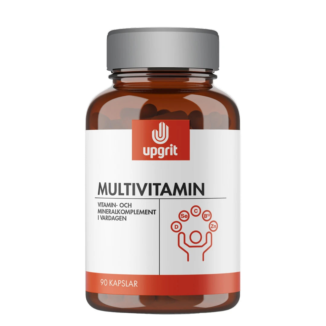 Upgrit Multivitamin 90 caps tummanruskeassa purkissa, jossa on harmaa kansi ja valkoinen etiketti punaisin yksityiskohdin., kuva 1/1