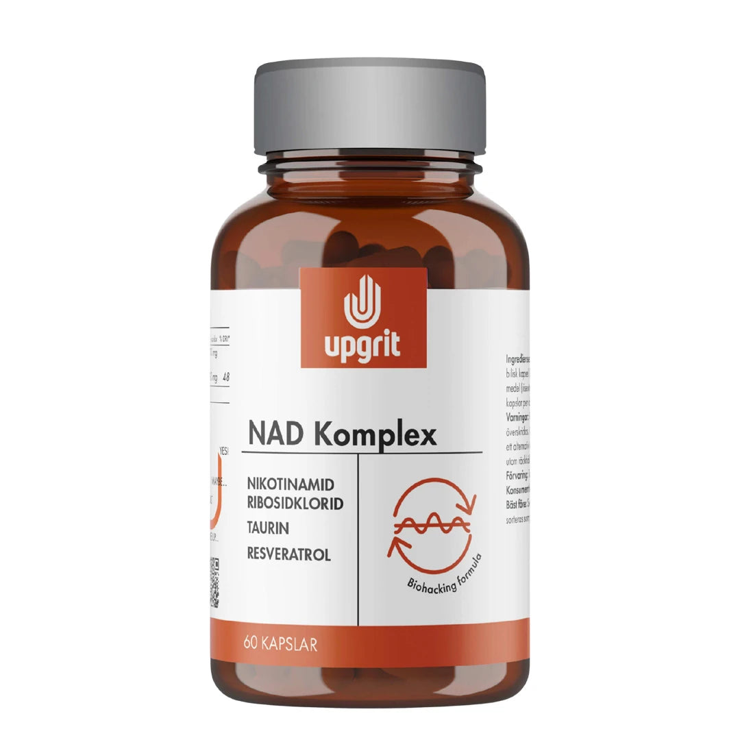 Upgrit NAD-Komplex 60 kapselia ruskeassa lasipurkissa, jossa on valkoinen etiketti ja oransseja yksityiskohtia., kuva 1/1