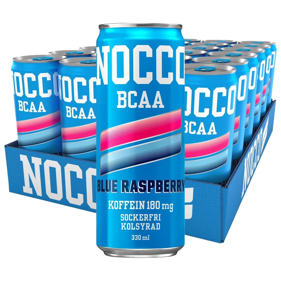 24 x NOCCO BCAA 330 ml Blue Raspberry sinisessä laatikossa vaaleansinisillä tölkeillä ja pinkeillä yksityiskohdilla., kuva 1/1