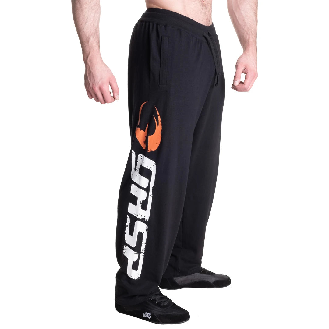 GASP Sweatpants Black/White -mustat treenihousut, joissa on suuri pystysuora logopainatus lahkeessa., kuva 3/6