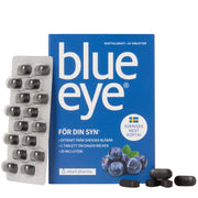 Elexir Pharma Blue Eye 64 tabs, ravintolisä sinisessä rasiassa tummia tabletteja sisältävän läpipainopakkauksen ja mustikoiden vieressä.
