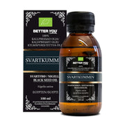 Better You Svartkumminolja EKO Kallpressad 100 ml tummassa lasipullossa mustan pakkauksensa vieressä.