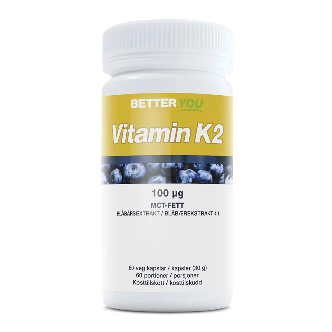Better You Vitamin K2 100 µg - 90 kaps -ravintolisä valkoisessa purkissa keltaisella etiketillä ja mustikkakuviolla., kuva 1/1