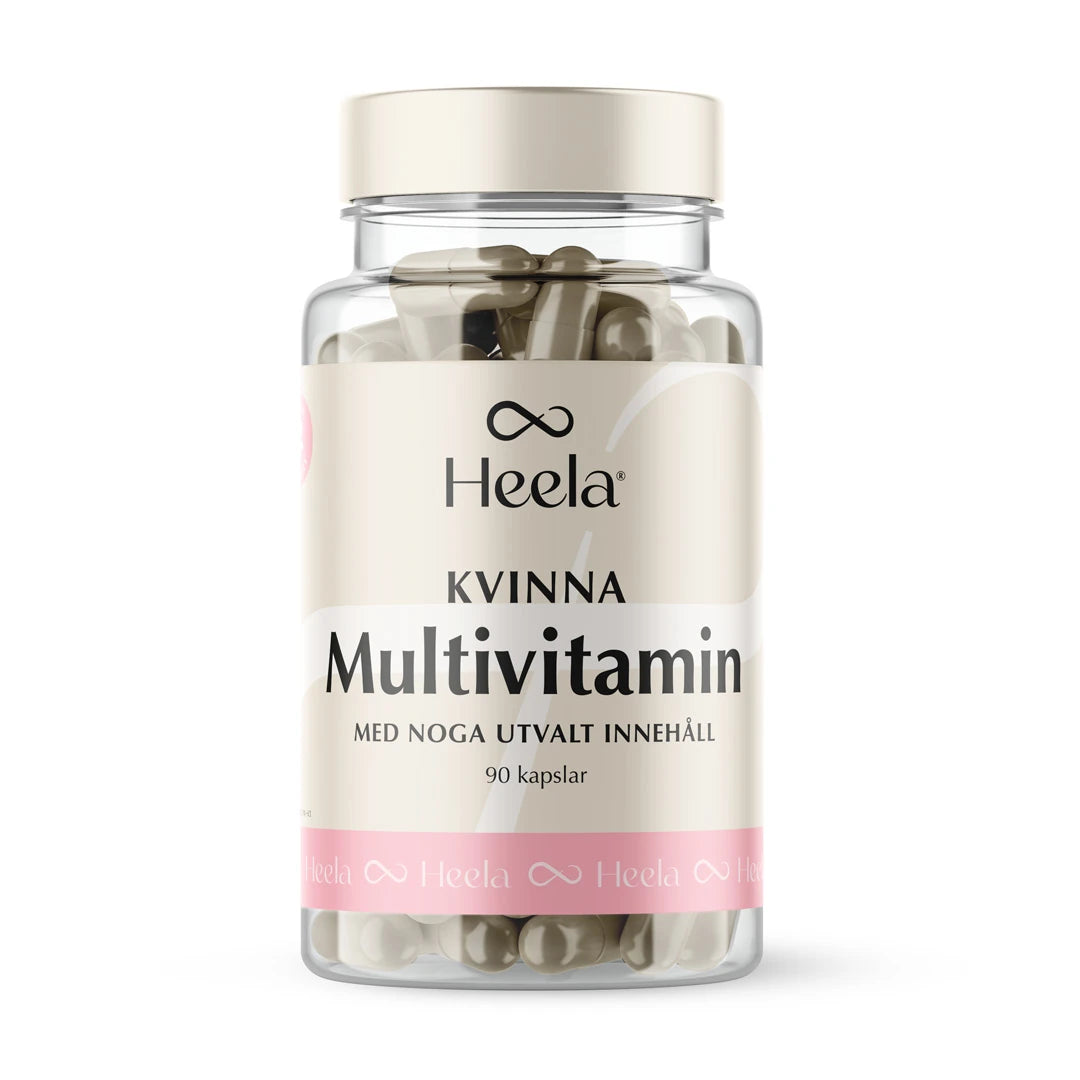 Heela Multivitamin Woman 60 caps läpinäkyvässä purkissa, jossa on vaalea kansi ja beige etiketti pinkeillä yksityiskohdilla., kuva 1/1