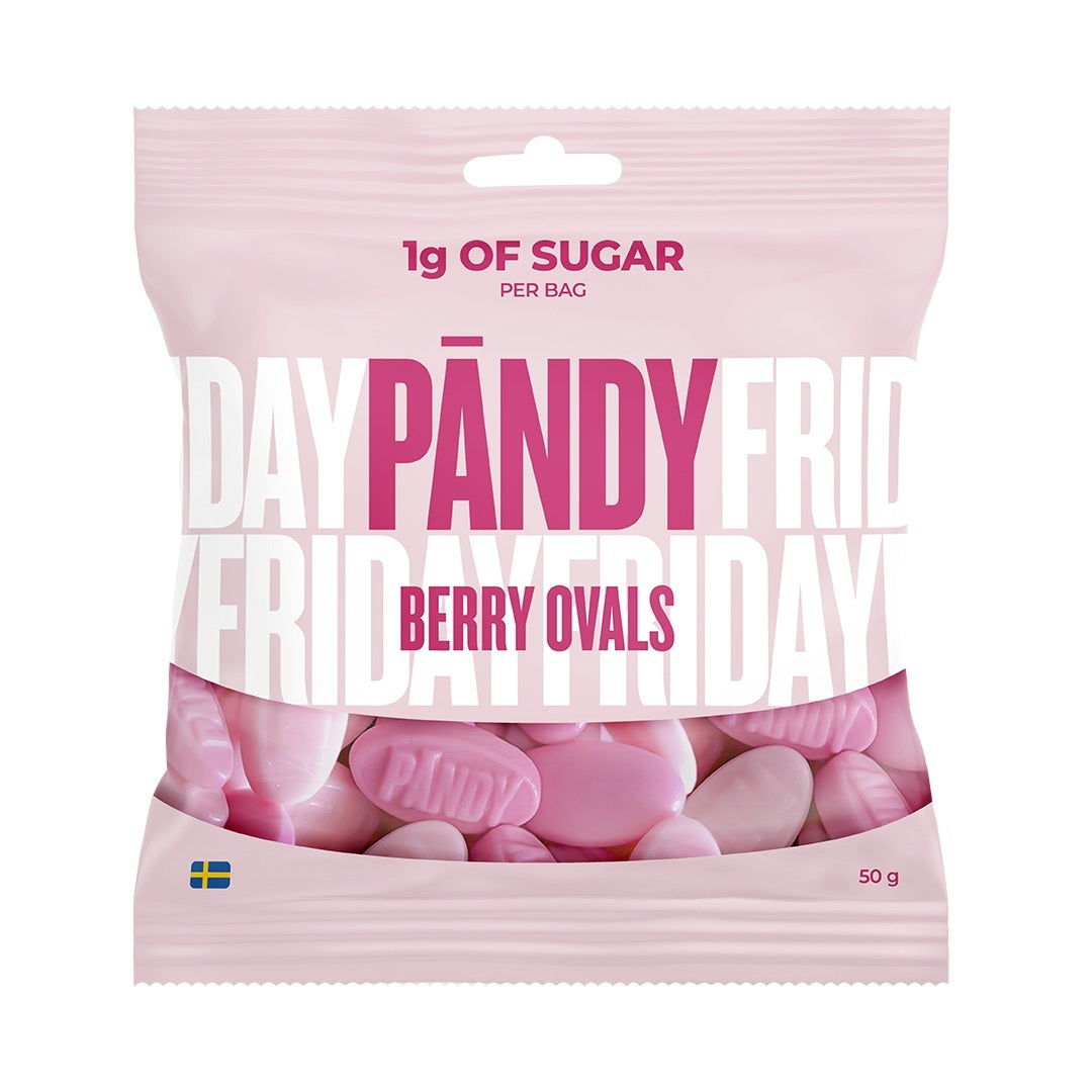 Pändy Candy 50 g Berry Ovals vaaleanpunaisessa karkkipussissa, jonka pohjalla on pinkkejä ja valkoisia vaahtokarkkeja.