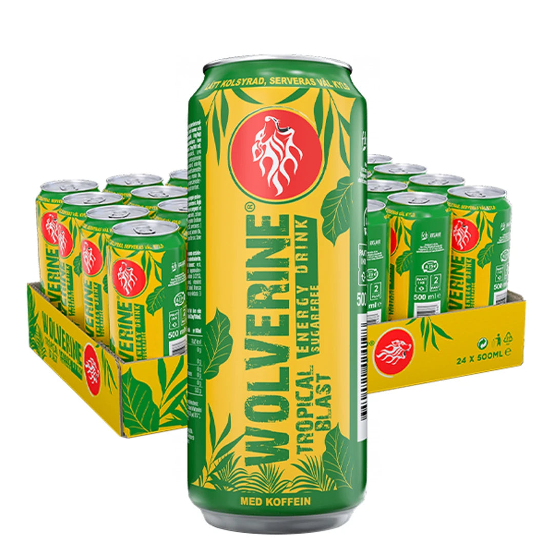 24 x Wolverine Energy Drink 500 ml Tropical Blast keltaisessa laatikossa, täynnä viherkeltaisia lehtikuvioisia tölkkejä., kuva 1/1