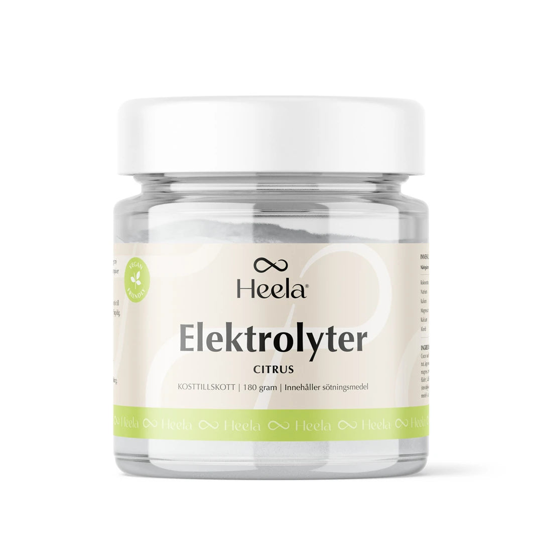 Heela Elektrolyter 180 g sitrus-elektrolyyttijauhe läpinäkyvässä purkissa valkoisella kannella ja vihreällä etiketillä., kuva 1/1