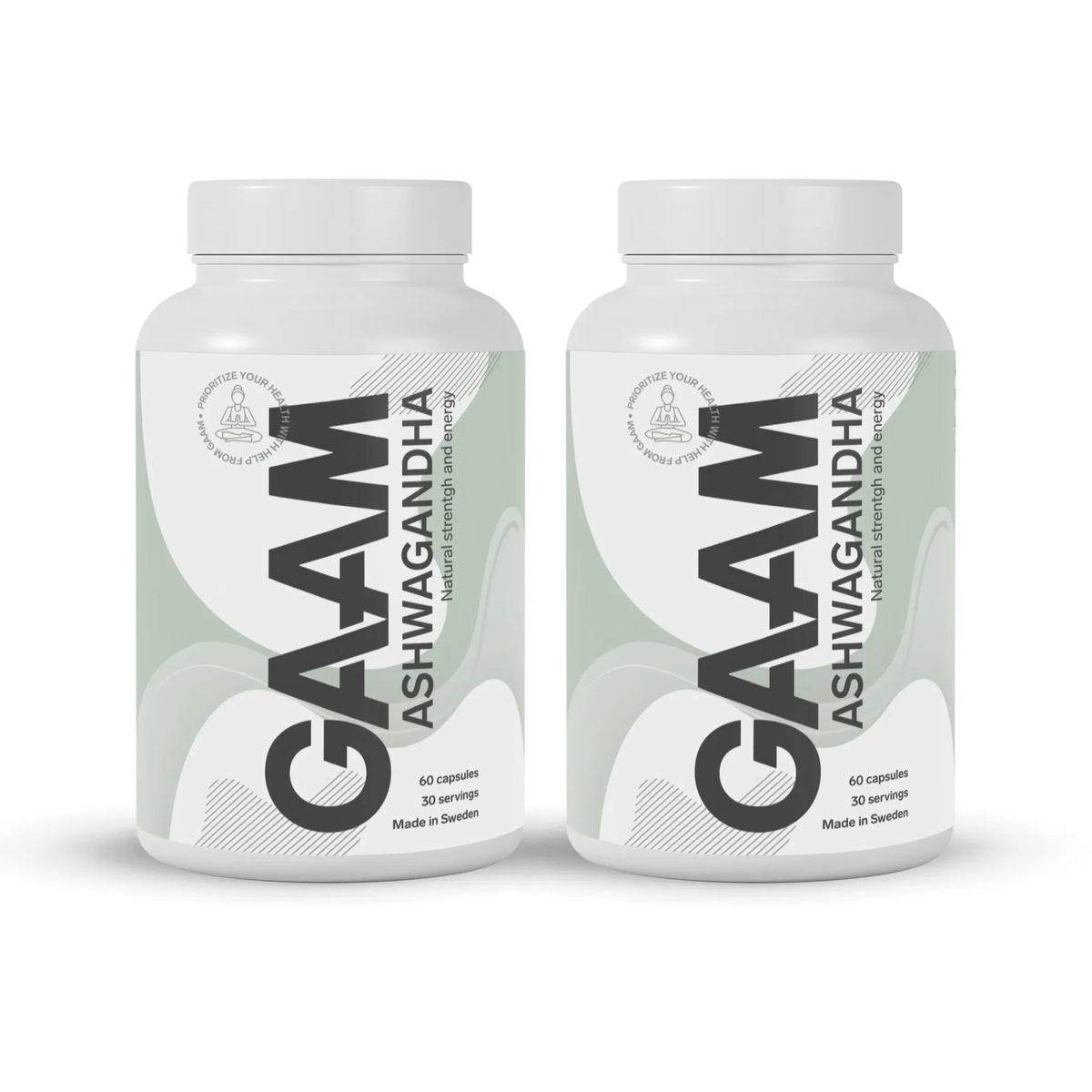 2 x GAAM Ashwagandha 60 caps -ravintolisä kahdessa valkoisessa purkissa harmailla ja mustilla yksityiskohdilla., kuva 1/1