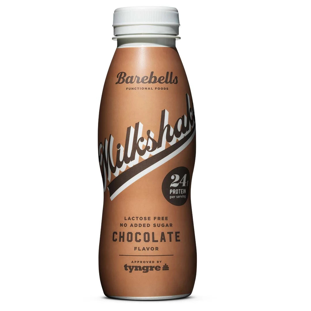 Barebells Milkshake 330 ml proteindryck i en brun flaska med vit kork för smaken Chocolate., bild 1 av 9