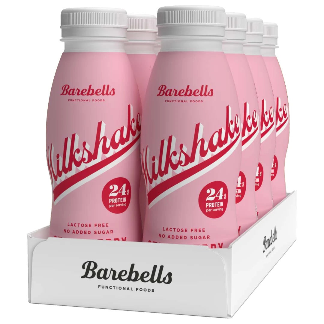 8 x Barebells Milkshake 330 ml Strawberry valkoisessa pakkauksessa, vaaleanpunaiset pullot punaisilla yksityiskohdilla., kuva 1/1