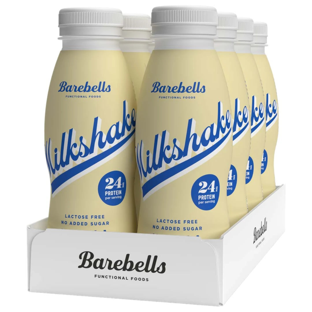 8 x Barebells Milkshake 330 ml Vanilla vaaleankeltaisissa pulloissa sinisellä tekstillä, valkoisessa laatikossa., kuva 1/1