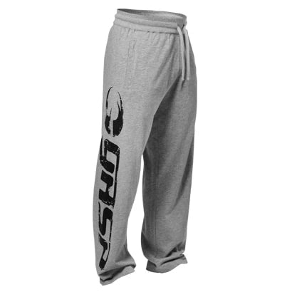 Harmaameleeratut GASP Sweat Pants Greymelange -treenihousut, joiden lahkeessa on suuri musta logo., kuva 4/6