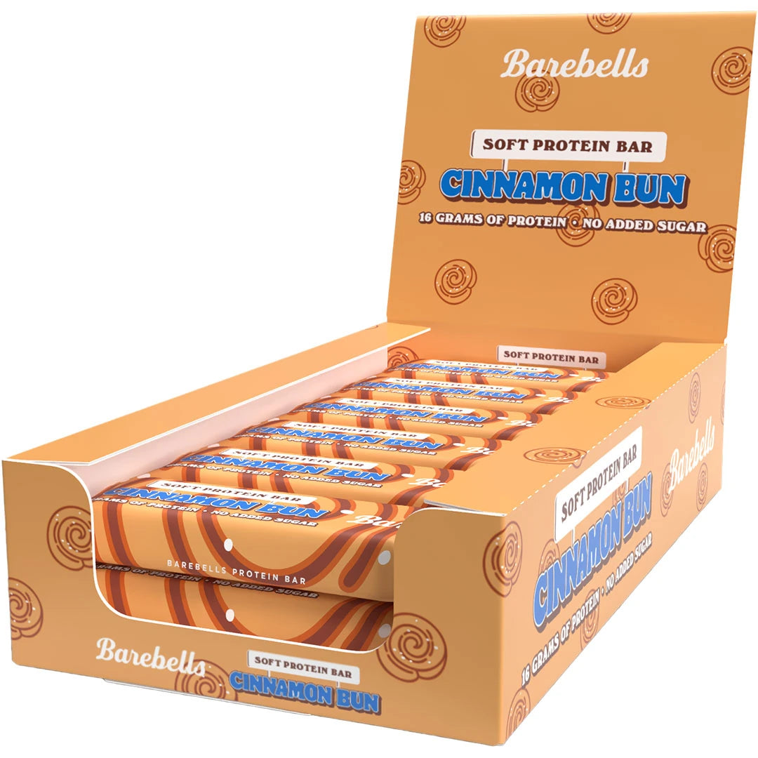 12 x Barebells Soft Bar 55 g Cinnamon Bun oranssissa laatikossa kanelipullakuvioilla ja sinisillä yksityiskohdilla., kuva 1/1