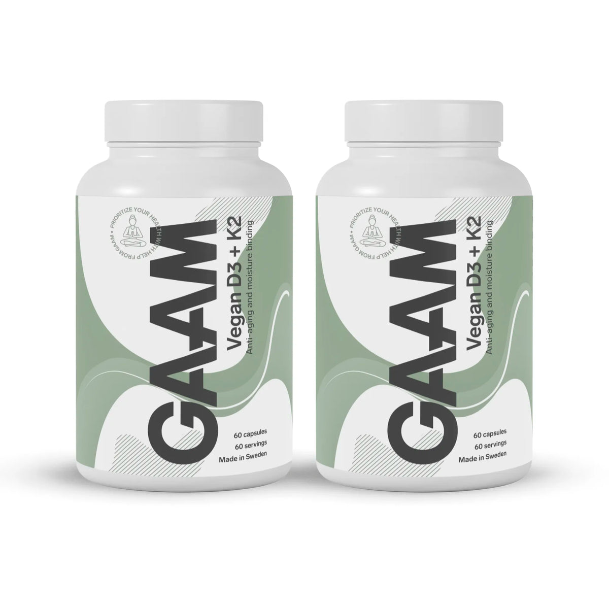 2 x GAAM Vegan D3 + K2 60 caps -ravintolisä kahdessa valkoisessa purkissa vihreillä ja harmailla yksityiskohdilla., kuva 1/1
