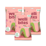 3 x Wellibites Candy 70 g Päron & Melon kolmessa vaaleanpunaisessa karkkipussissa, joissa on värikäs sateenkaari.