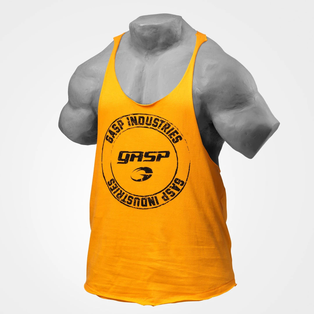 GASP Stringer Yellow, keltainen puuvillainen treenitoppi löysällä istuvuudella ja suurella mustalla GASP-logolla rinnassa., kuva 1/4