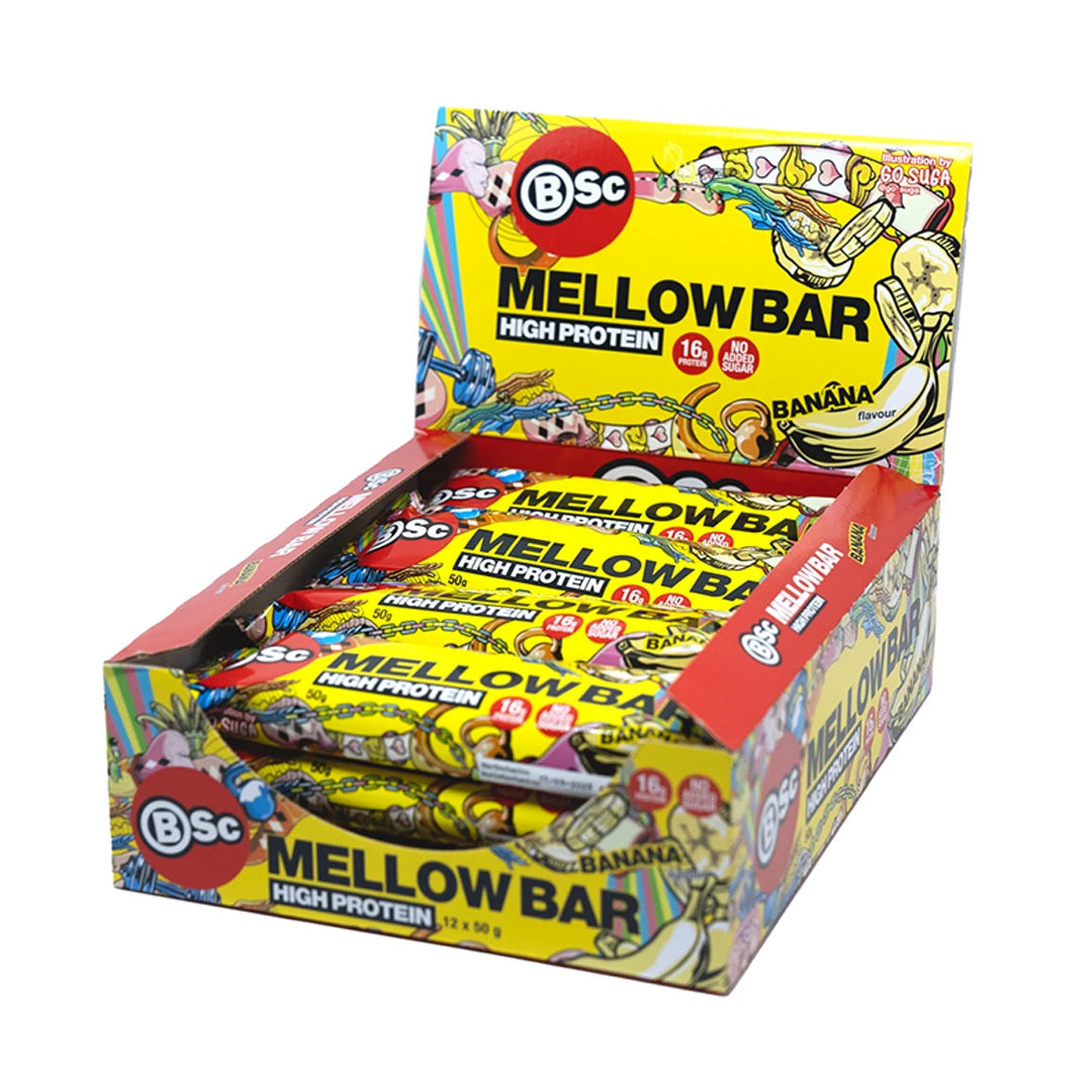 12 x BSc Mellow Bar 50 g Banana värikkäässä keltaisessa esittelylaatikossa, jossa on leikkisiä kuvituksia., kuva 1/1