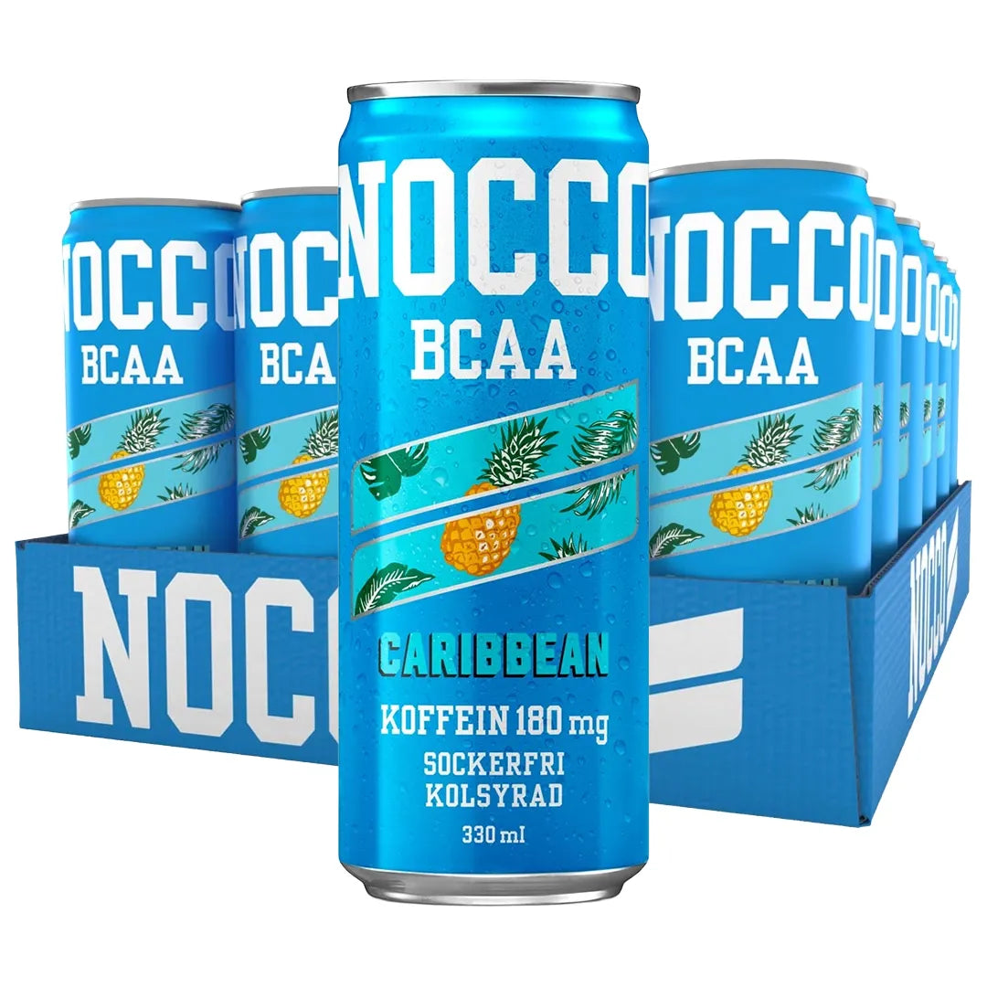 24 x NOCCO BCAA 330 ml Caribbean sinisessä laatikossa turkooseja tölkkejä ananaskuvioilla ja valkoisilla yksityiskohdilla., kuva 1/1