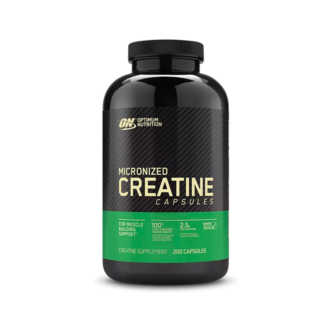 Optimum Nutrition Creatine Capsules 200 caps mustassa purkissa, jossa on vihreä etiketti., kuva 1/1